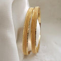 Fine Ribbed Gold Bangles