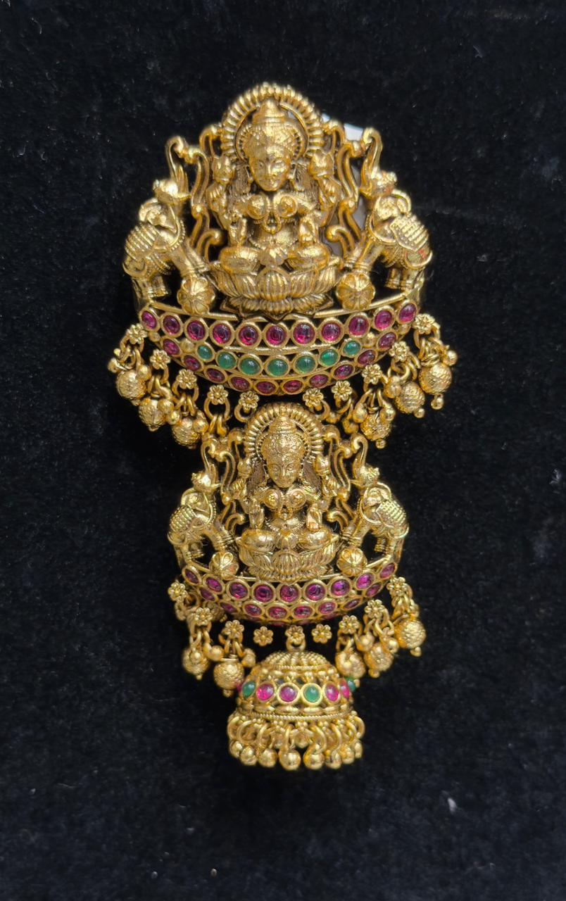 Traditional Temple Jewellery features an intricate tiered design showcasing the auspicious Goddess Lakshmi