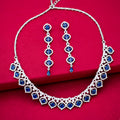 Elegant silver-tone necklace set with matching long earrings.